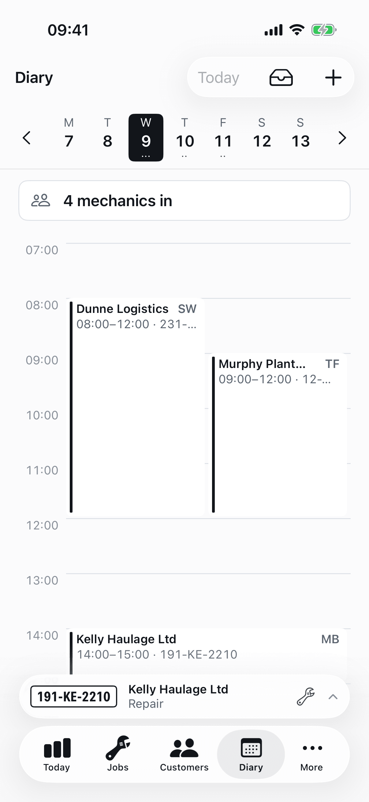 The diary on iPhone: a day's bookings on a timeline, with the number of mechanics rostered above it